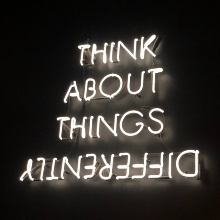 "Think about things differently" (with differently shown backwards)
