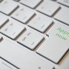 Keyboard with "apply now" key